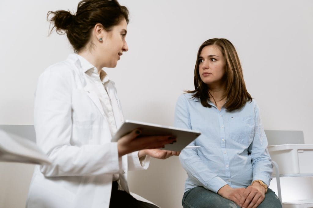 woman with doctor
